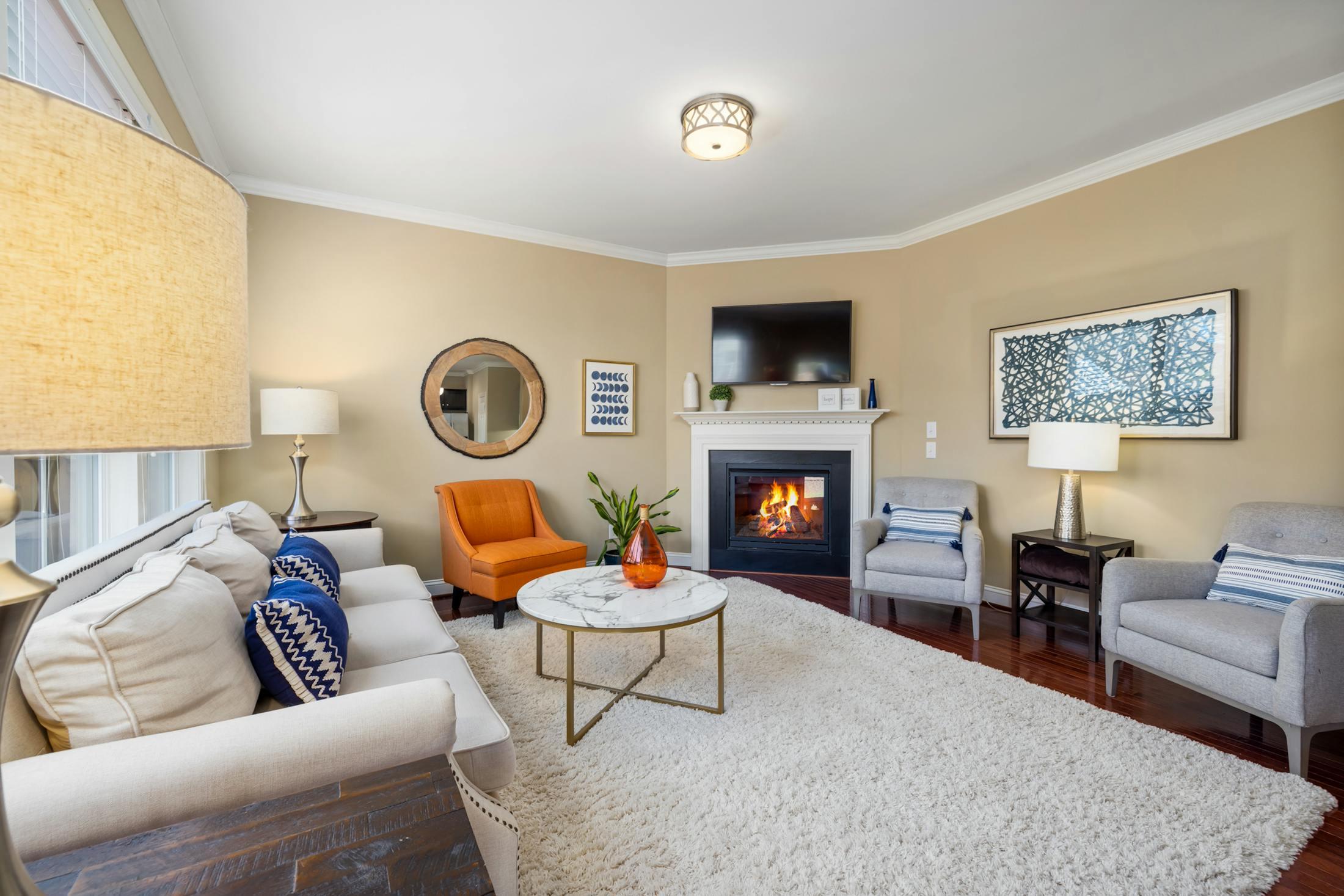 Bright staged living room with premium furniture